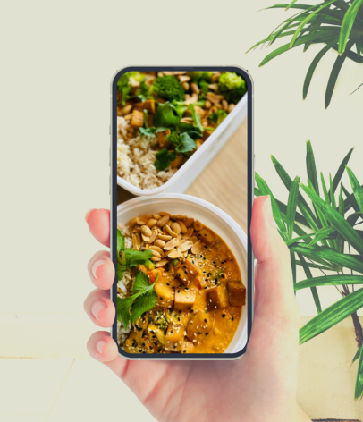 Image of a phone with a photo of a meal on it fullscreen